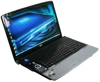 Acer Aspire 8920G laptop with open lid displaying screen.