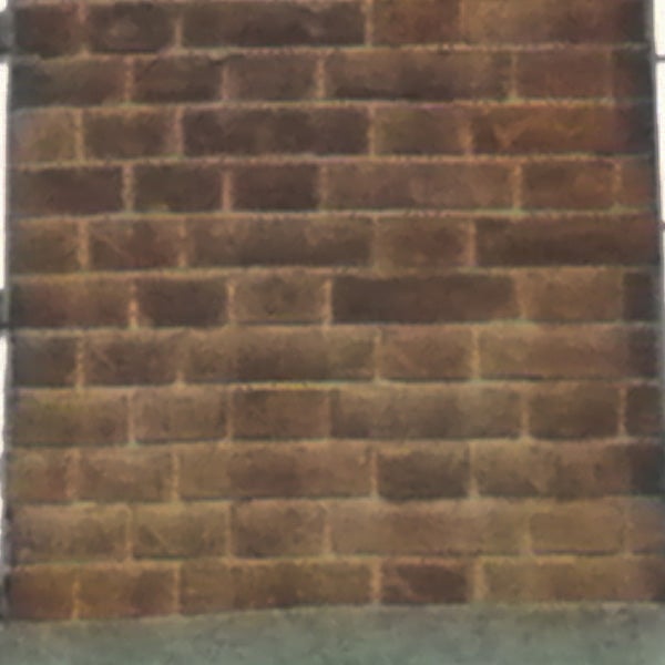image of a brick wall possibly by Pentax Optio M50.brick wall, poor image quality example.