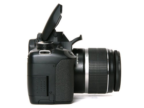 Canon EOS 450D DSLR camera with lens on white background.