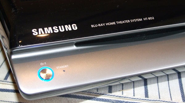 Close-up of Samsung HT-BD2 home theater system on standby.Close-up of Samsung HT-BD2 Blu-ray Home Theater System.