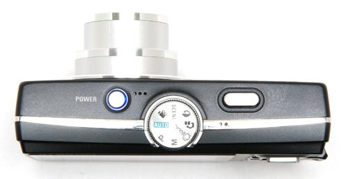 Samsung L210 digital camera top view showing controls.Samsung L210 digital camera top view on white background.