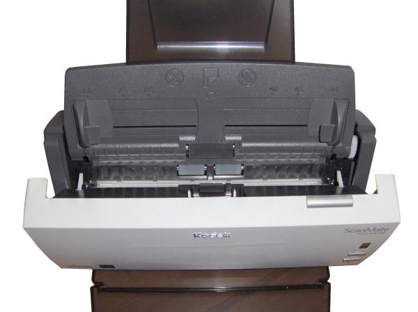 Kodak ScanMate i1120 scanner open and ready for use.