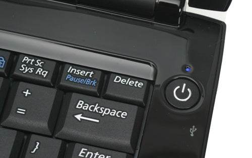 Close-up of Samsung Q210 notebook's power button and keyboard.Close-up of Samsung Q210 notebook power button and keyboard keys.