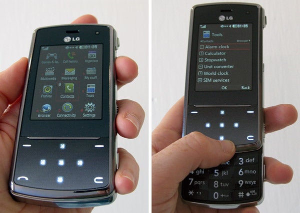 Hand holding LG KF510 phone showing front and keypad lighting.Hand holding LG KF510 phone showcasing touchpad and screen