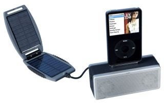 PowerTraveller K3000ST solar speaker charging an iPod.