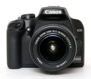 Canon EOS 1000D DSLR camera with 18-55mm kit lens.