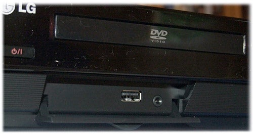 Close-up of LG HT503TH Home Cinema System DVD player.Close-up of LG HT503TH Home Cinema System's DVD player.