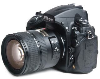 Nikon D700 DSLR camera with attached zoom lens.