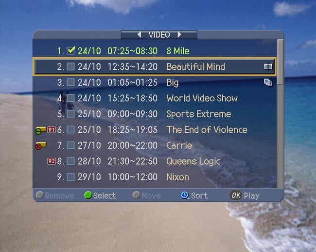 Humax PVR interface with recorded TV program list on screenHumax PVR-9300T interface displaying recorded TV program list.