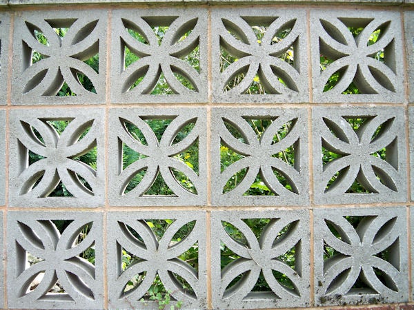 Decorative concrete block wall with geometric patterns.Concrete decorative blocks with geometric patterns.