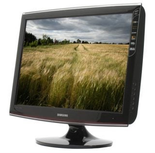 Samsung SyncMaster T240HD 24-inch DTV monitor displaying landscape picture.