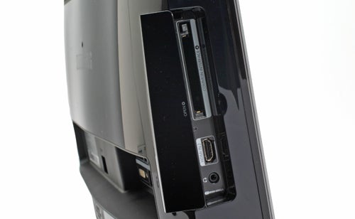 Samsung SyncMaster T240HD monitor side connectivity ports.Side view of Samsung SyncMaster T240HD monitor showing ports.