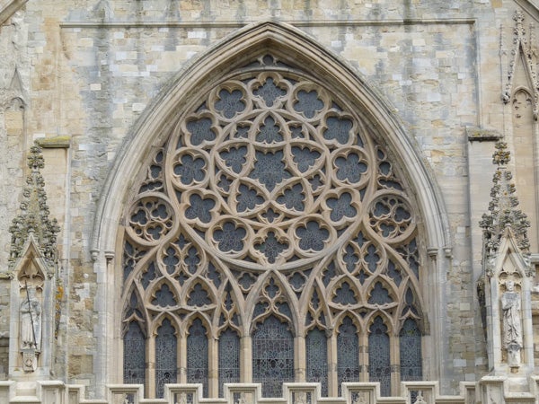 Photo captured with Panasonic Lumix DMC-FZ28 showing detailed cathedral architecture.Detailed architecture of a Gothic church window.