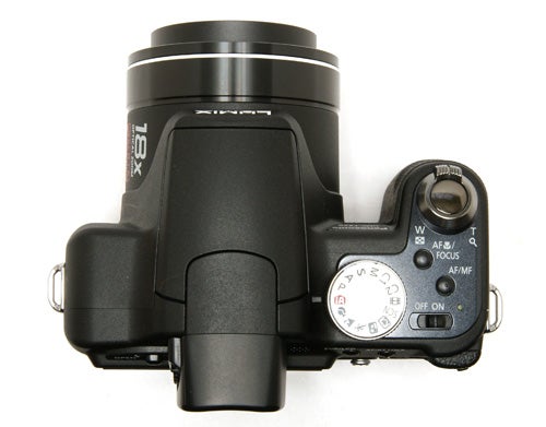 Panasonic Lumix DMC-FZ28 camera from top view.Panasonic Lumix DMC-FZ28 camera top view showing controls.