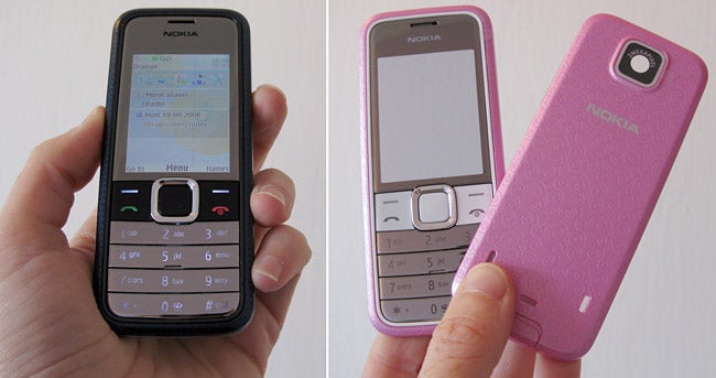 Nokia 7310 Supernova phone held in hand, front and back view.Nokia 7310 Supernova phone held showcasing front and back