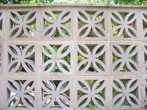 Decorative concrete block wall with leaf patternsDecorative concrete block wall with geometric patterns