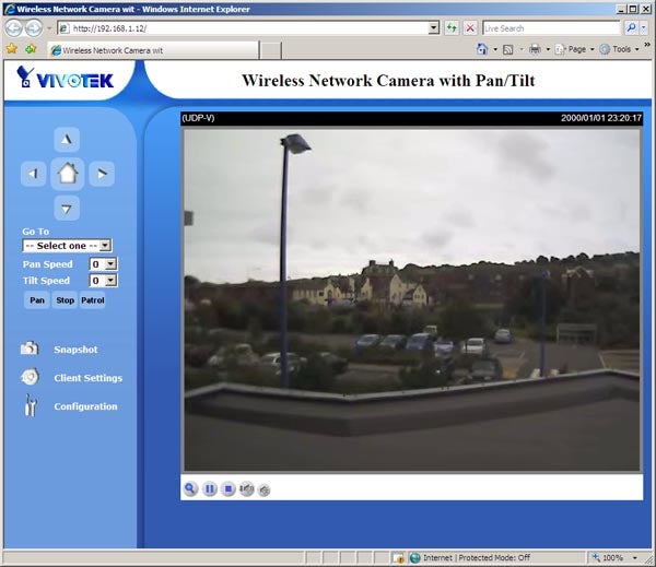 Screenshot of Vivotek PT7137 camera's web interface on a monitor.Screenshot of Vivotek Network Camera interface with live view.
