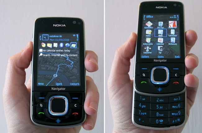 Nokia 6210 Navigator phone with open navigation and menu screens.Nokia 6210 Navigator phone held in hand displaying screen menus