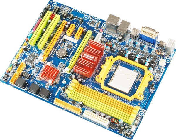 Biostar TA790GX A2+ motherboard with CPU socket and RAM slots.Biostar TA790GX A2+ motherboard on white background.