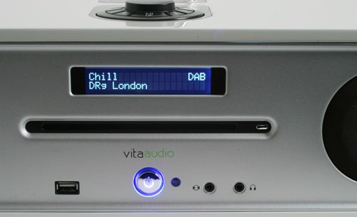 Close-up of Vita Audio R4 displaying DAB radio channel.Vita Audio R4 integrated music system display and controls.