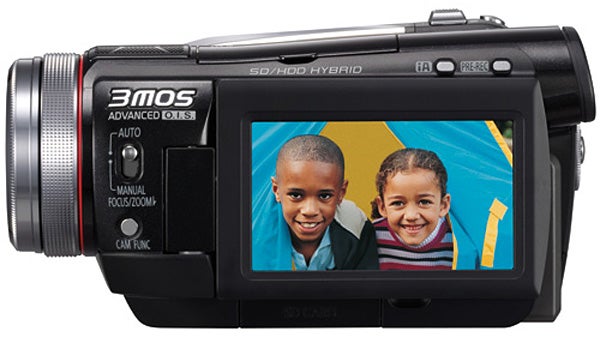 Panasonic HDC-HS100 camcorder displaying two smiling children on its screen.Panasonic HDC-HS100 camcorder displaying two smiling children.