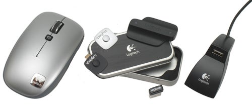 Logitech V550 Nano mouse with clip-and-go dock and receiver.Logitech V550 Nano mouse with docking station and USB receiver.