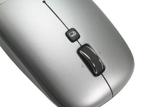Close-up of Logitech V550 Nano mouse with scroll wheel.