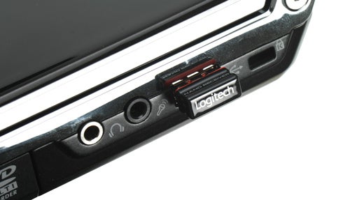 Logitech V550 Nano receiver plugged into laptop's USB port.Logitech V550 Nano receiver connected to laptop's USB port.