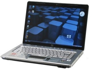 HP Pavilion dv5-1011ea notebook with open lid displaying screen.