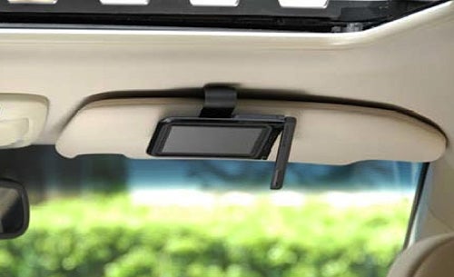 Bluetrek Surface Sound Compact installed in car sun visor.Bluetrek Surface Sound Compact attached to car sun visor.