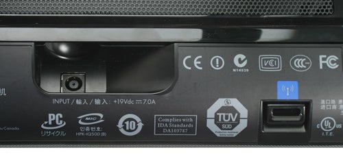 Close-up of HP TouchSmart IQ500 PC's label and certification marks.Close-up of HP TouchSmart IQ500 PC label and input ports.