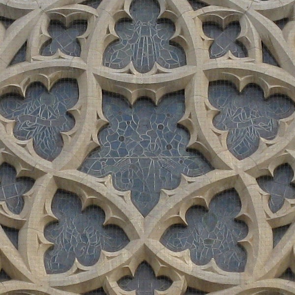 Close-up of intricate stone architectural details.Detailed stone carvings on gothic architecture facade.