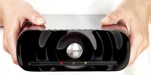Hands holding a TVonics DTR-Z250 Freeview PVR.