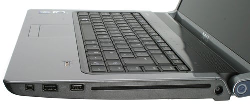 Dell Studio 15 laptop showing keyboard and side ports.Dell Studio 15 notebook showing keyboard and side ports.
