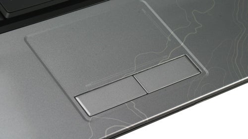 Close-up of Dell Studio 15 laptop touchpad and design detail.Close-up of Dell Studio 15 laptop's touchpad and patterned palm rest.