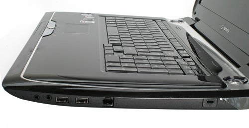 Close-up of Toshiba Qosmio G50-115 entertainment notebook keyboard.Close-up of Toshiba Qosmio G50-115 entertainment notebook side ports.