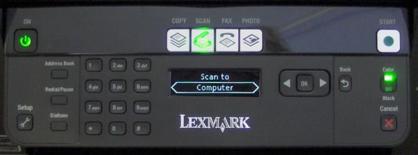 Lexmark X5650 printer control panel with display and buttons.Lexmark X5650 printer control panel with 'Scan to Computer' option.