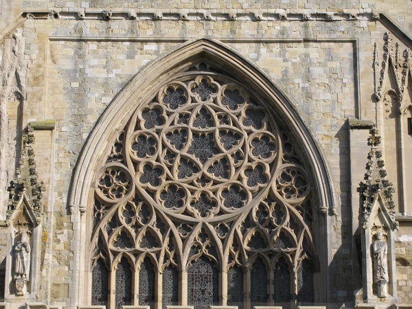 Detailed photo of a gothic church window taken with Canon PowerShot.