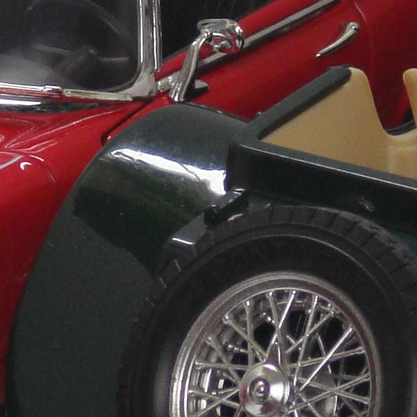 Close-up of a red and black vintage model car