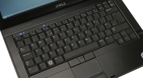 Dell Latitude E6400 laptop keyboard and partial screen view.