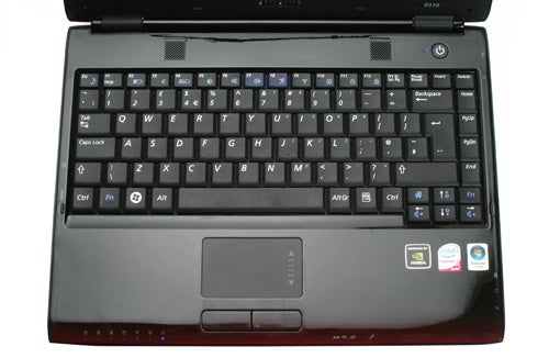 Samsung Q310 notebook open showing keyboard and screen.