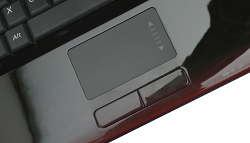 Close-up of Samsung Q310 notebook touchpad and buttons.