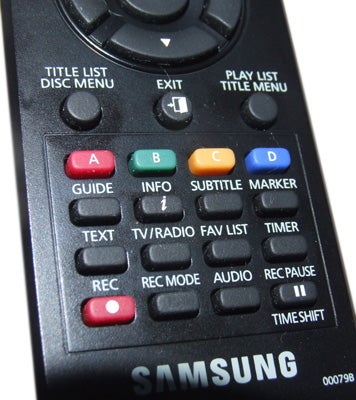 Samsung DVD-SH875M remote control close-up.