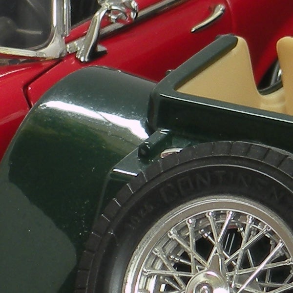 Close-up of a scale model car showing sharp detail.