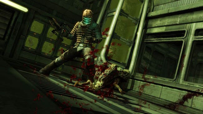 Character from Dead Space fighting an alien creature.