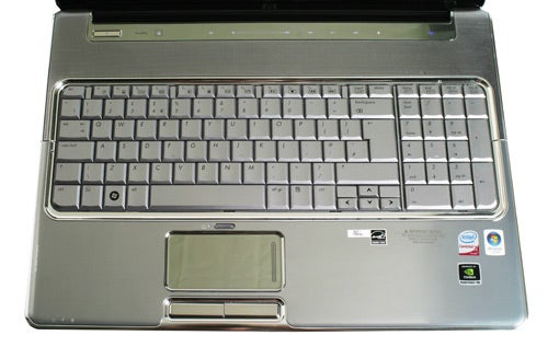 HP Pavilion dv7-1000ea laptop keyboard and touchpad close-up.