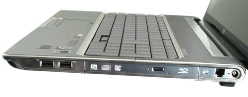HP Pavilion dv7-1000ea laptop showing ports and optical drive.