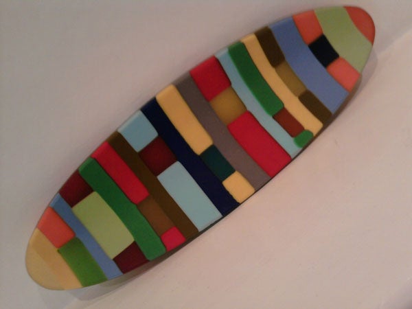 Colorful abstract skateboard deck design.