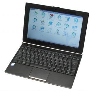 Asus Eee PC S101 netbook with open lid displaying desktop.