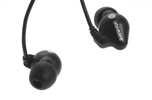 Shure SE102 earphones isolated on white background.